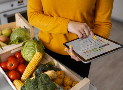 Two people interacting with digital windmill interface